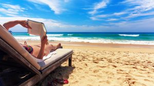 Read more about the article 6 Literary Beach Reads: Your (Somewhat) Classy Summer Reading List